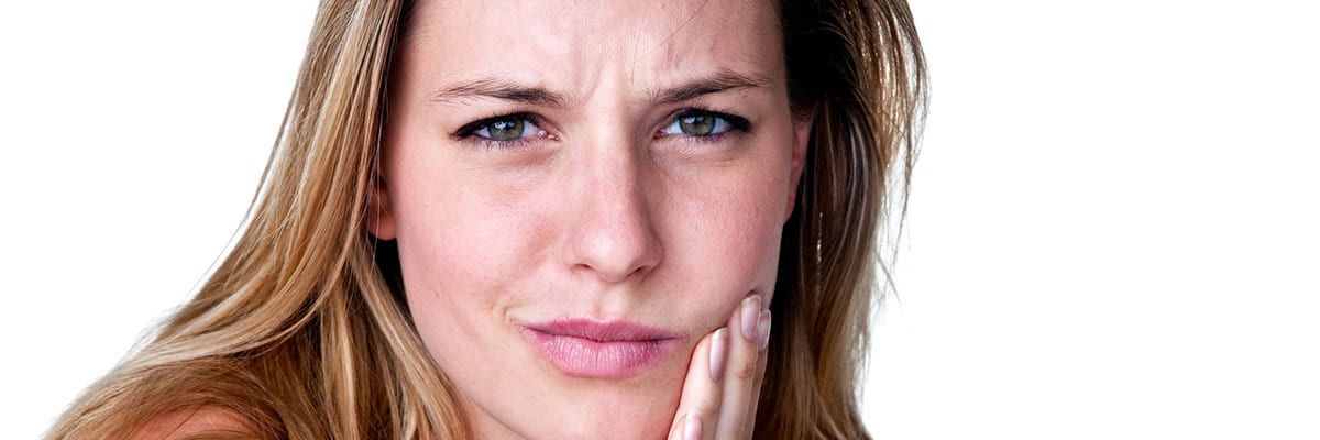 Paciente con dolor dental en consulta de endodoncia